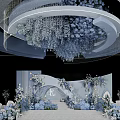 Banquet Hall With Blue And White Floral Decorations Circular Chandelier And Elegant Stage Backdrop