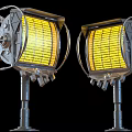 Two Vintage Metal Lamps With Yellow Glowing Grilles Coiled Cords And Industrial Bases