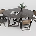 Round Wooden Dining Table Set With Four Chairs Vase Green Plant And Magazine
