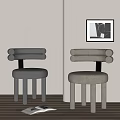 Gray And Beige Dining Chairs With Cylindrical Armrests And Legs Light Colored Walls Wooden Floors