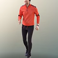 Man Wearing Orange Sporty Top And Black Pants Walking With Wristwatch In Active Pose