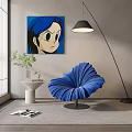 Blue Pleated Accent Chair In Modern Living Space With Floor Lamp Wall Art And Potted Plant