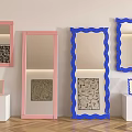 Pink And Blue Wavy Frame Mirrors For Interior Display With White Pedestals