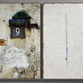 Wall Art Showcasing Vintage Wall With Mailbox Number 9 And Light Wall Vertical Dark Line