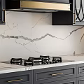 Modern Kitchen Interior With Gray Cabinets Marble Countertop Range Hood And Built In Ovens