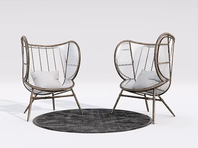 Modern Wicker Leisure Chairs with Metal Frame Plush Cushions and Round Dark Rug 3d model