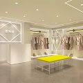 Modern Clothing Store Interior With Clothes On Racks Mannequins And Shoes