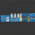 Display Of Modelo Special Beer Bottles And Blue Packaging Boxes On Reflective Surface