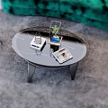 Green Velvet Sofa And Black Coffee Table Set With White Green Cushions Abstract Painting Dark Green Walls Decorative Items