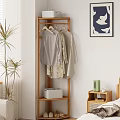 Bedroom Wooden Coat Rack With Hanging Clothes Storage Box Green Bottle Plant And Wall Artwork