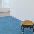 Comfortable Woven Padded Wheeled Low Stool For Convenient Movement In Home And Office Interiors