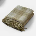 Cozy Plaid Folded Blanket With Decorative Tassels On White Background