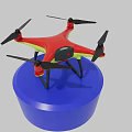 Red and Yellow Drone with Black Propellers on Blue Circular Platform
