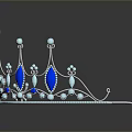 Elegant Silver Crown With Sparkling Blue Gemstones And Intricate Decorations