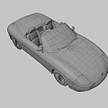 Silver Convertible Sports Car With Red Leather Seats And Alloy Wheels