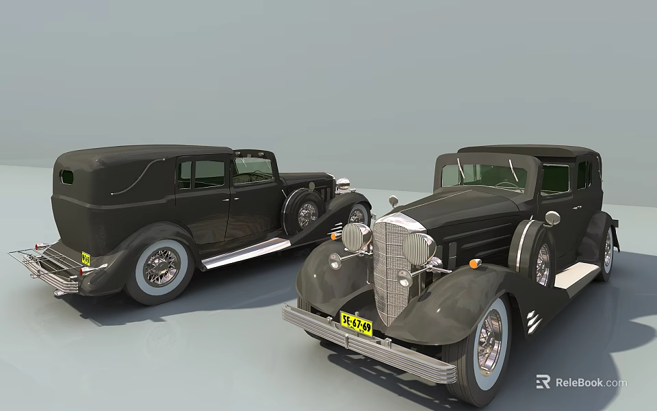 Two Vintage Classic Cars With Dark Exterior And Retro Design Elements 3d model 