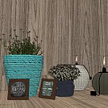 Decorative Potted Plants with Braided Basket Navy Pot on Wooden Floor and Photo Frames