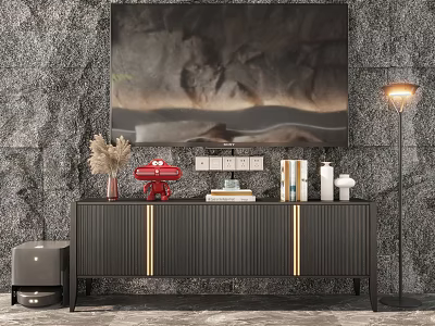Dark TV Stand with Gold Accents against Stone Wall with Wall Art and Decorative Items 3d model