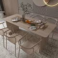 Modern Wooden Dining Table And Chairs Set With Green Plant Oranges And Plates