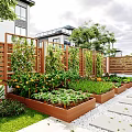 Wooden Fence Enclosed Garden Landscape With Raised Planter Boxes Vegetables Stone Path And Lawn