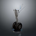 Black Aircraft Tires with Rims and Silver Metal Landing Gear on Display Stand