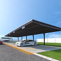 Covered Parking Lot With Parked Cars Gray Pavement Green Lawn And Blue Sky