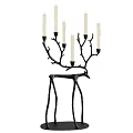 Black Metal Deer Shaped Candle Holder With Six White Candles And Decorative Branches