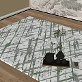 Square Rug With Green And White Geometric Pattern On Wooden Floor With Teapot Vase
