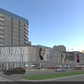 Modern Urban Commercial Street With Glass Facades Shopping Mall Pedestrians And Vehicles