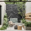 Tranquil Garden Retreat With Black Stone Wall Lush Plants Wooden Chair And Water Feature