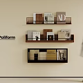Poliform Minimalist Wall Shelves Displaying AD ELLE Magazines On Beige Wall