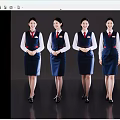 Women In Smart Blue Flight Attendant Uniforms Standing In A Row