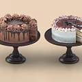 Two Decorated Cakes on Black Stands with Chocolate and Vanilla Frosting Slices