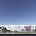 Modern White Sales Office Building With Geometric Facade Pink Flowering Tree And Water Pool