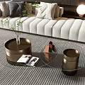 Elegant Modern Coffee Table With Glass Top Metal Base Small Plant And White Sofa