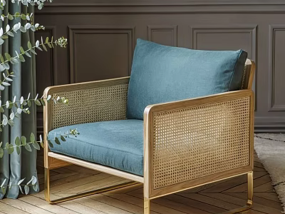 Stylish Rattan Leisure Chair With Blue Cushion Gold Frame And Green Plants 3d model