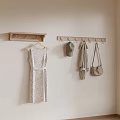 Minimalist Room Corner With Wall Mounted Racks Holding Dress Hat Scarf And Handbags