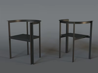 Two Modern Metal Frame Dining Chairs With Black Seat And Sleek Design 3d model
