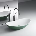 Modern Bathroom Interior Featuring Oval Orange White Green Washbasin With Black Faucet And Mirror