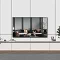 Modern White TV Stand With Mounted TV Green Plant And Decorative Items