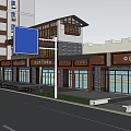 Commercial Street With Multi Story Buildings Storefronts And Street Signboards