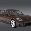 Brown Luxury Sedan With Sleek Exterior Design And Silver Alloy Wheels