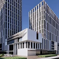 Modern Office Building With Glass Facade And Tall Structure In Greenery Surrounding Area