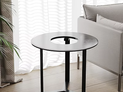 Modern Black Round Side Table With Hollow Center Top Beside Grey Sofa And White Curtains 3d model