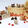 Cute Paper Cat Dolls with Wooden Boxes Pine Cones and Red Petals Near Wheat Ears
