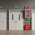 White Exit Doors With Green Signs And Red Fire Extinguisher Cabinet On Gray Walls