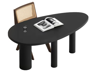 Black Oval Desk Featuring Open Magazine And Small Glass Next To Brown Woven Chair 3d model