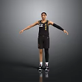 Basketball Player in Black Jersey with Number 22 Standing with Arms Outstretched Against Gray Background