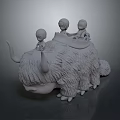 Three Tiny Human Figures Sitting On Shaggy Horned Creature Back Sculpture