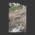 Outdoor Concrete Bench On Brick Pavement With Fallen Leaves And Snow Patches